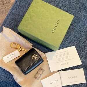 Gucci Black and Gold Money Holder Sleek Design